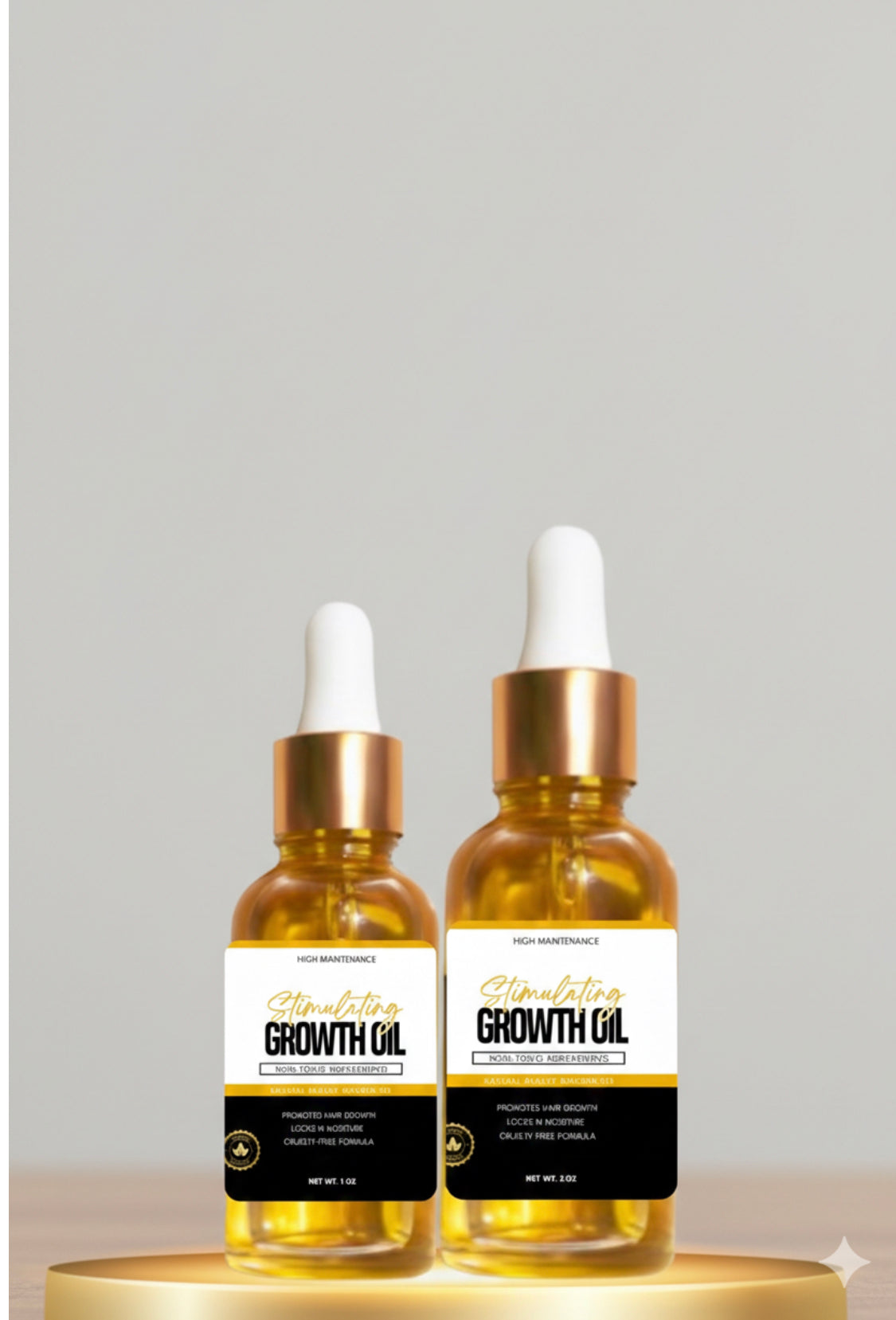 High Maintenance hair oil in clear glass doppler bottles in sizes 1oz and 2oz . black and white label . Oil is gold in color. All natural hair oil to promote healthy hair growth.